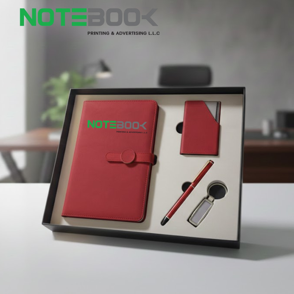 Luxury corporate gift set Dubai with personalized notebook, pen, card holder, and keychain