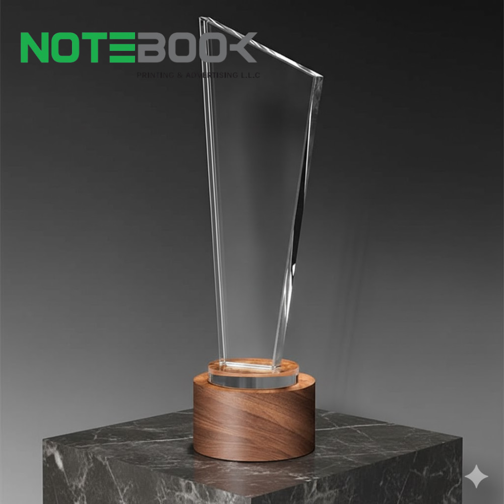 Crystal trophy with wooden base for corporate awards in Dubai featuring premium engraving