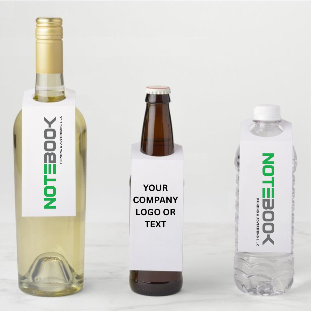 Custom bottle neck hang tags and branded bottle labels with gloss, matte, and velvet finishes for corporate gifts Dubai, promotional gifts Dubai, and corporate gifts UAE.