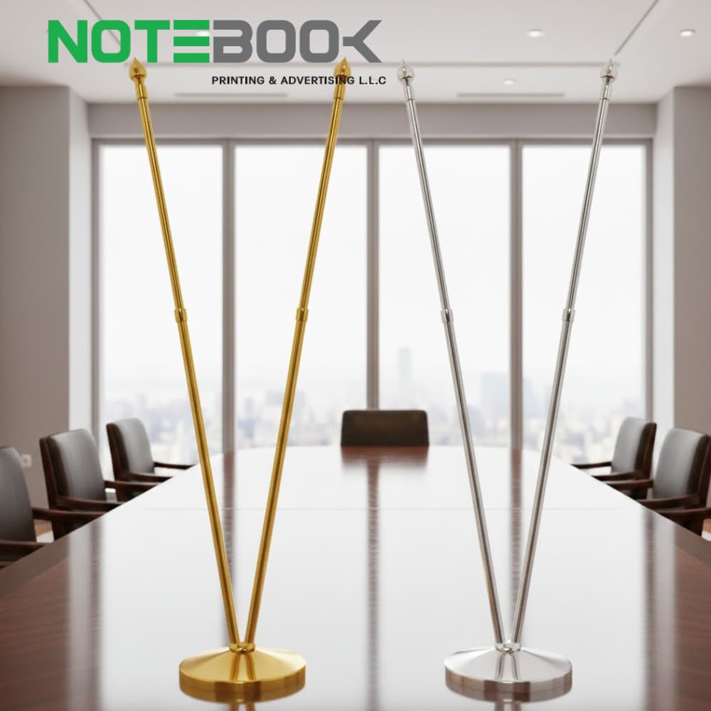 Double pole stainless steel flag stand with custom flag printing in Dubai office setting