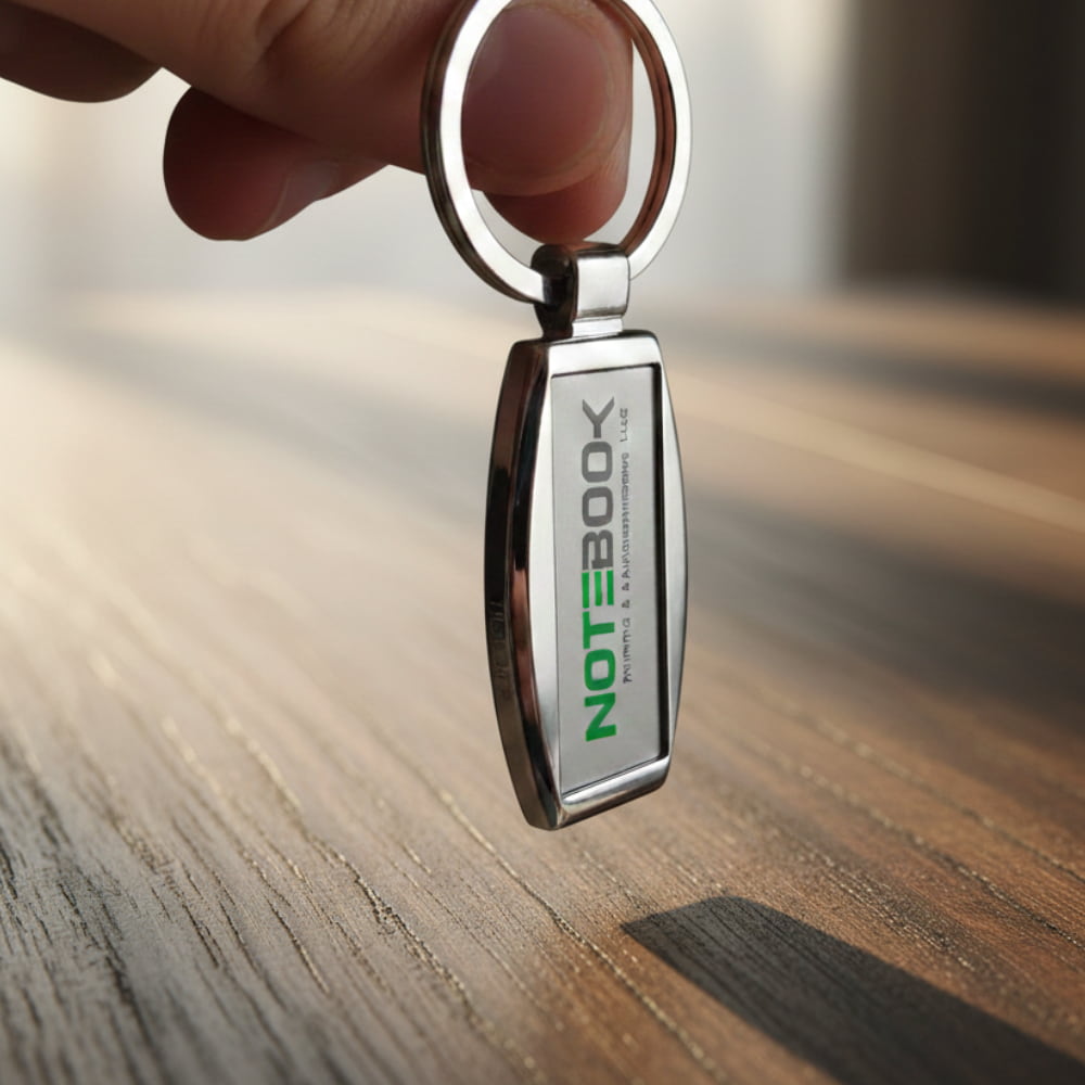 Oval metal keychain with smooth finish for logo engraving and branding